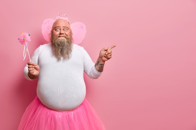 funny-man-wears-fairy-costume-invites-you-holiday-costume-party-indicates-right-blank-space-holds-magic-wand_273609-43367.jpg